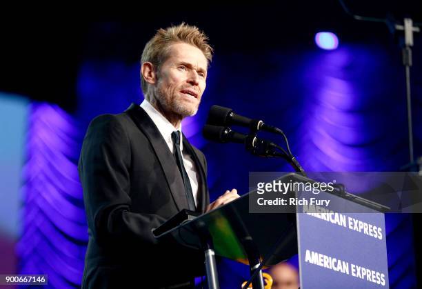 Willem Dafoe speaks onstage at the 29th Annual Palm Springs International Film Festival Awards Gala at Palm Springs Convention Center on January 2,...