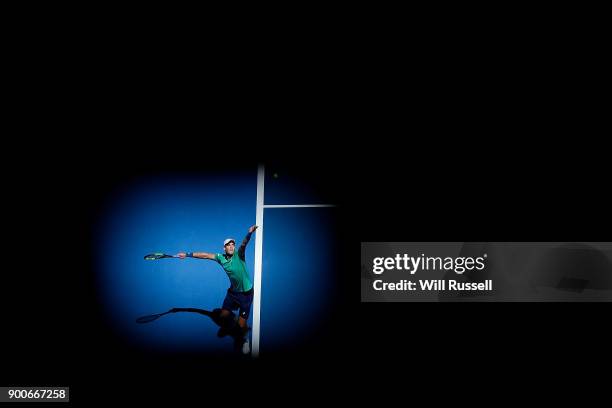 Vasek Pospisil of Canada serves to Alexander Zverev of Germany in the mens singles match on Day Five of the 2018 Hopman Cup at Perth Arena on January...