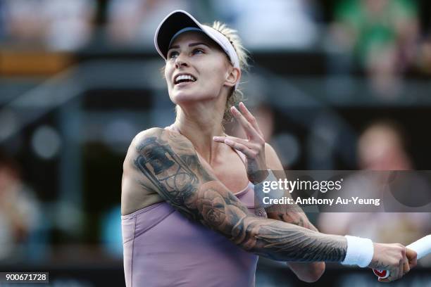 Tattoos are seen on the arms of Polona Hercog of Slovenia in her match against Kirsten Flipkens of Belgium during day three of the ASB Women's...