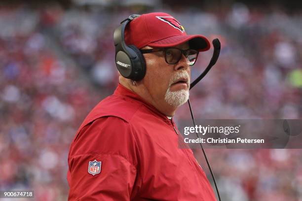 Head coach Bruce Arians of the Arizona Cardinals watches from the sidelines during the first half of the NFL game against the New York Giants at the...