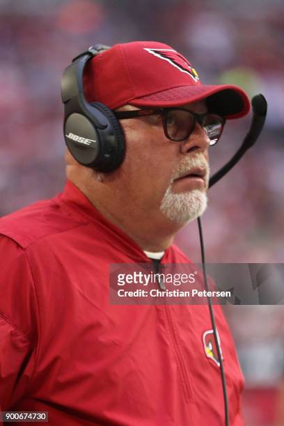 Head coach Bruce Arians of the Arizona Cardinals watches from the sidelines during the first half of the NFL game against the New York Giants at the...