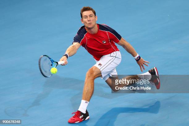 Matthew Ebden of Austraia plays a forehand in his match against Nick Kyrgios of Australia during day four of the 2018 Brisbane International at Pat...