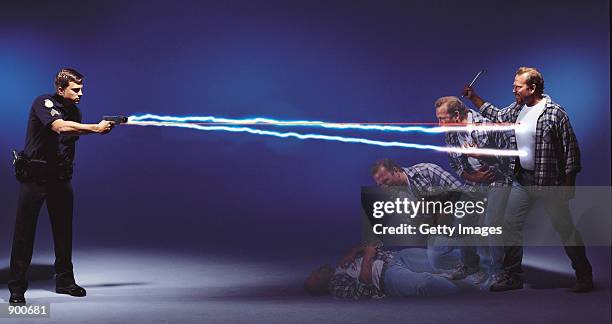 Police officer demonstrates the Air Taser stun gun, which has a range of 15 feet and delivers a paralyzing electric shock to its target in this...