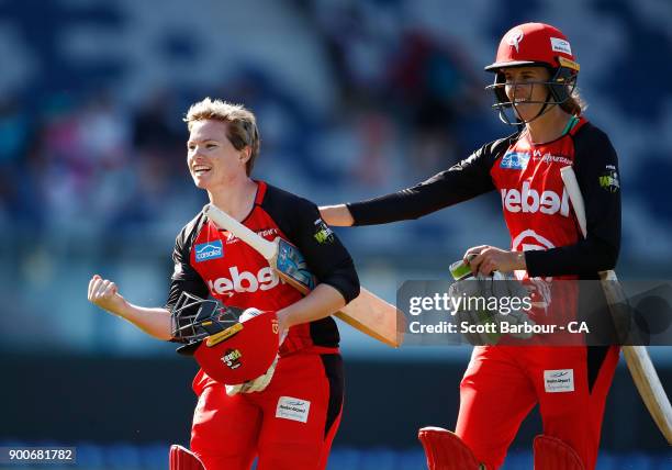 Amy Satterthwaite and Jess Cameron celebrate hitting the winning runs on the final ball in a super over during the Women's Big Bash League match...