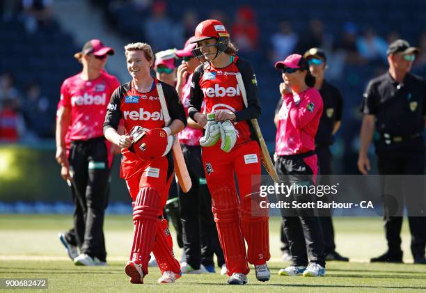 Amy Satterthwaite and Jess Cameron celebrate hitting the winning runs on the final ball in a super over during the Women's Big Bash League match...