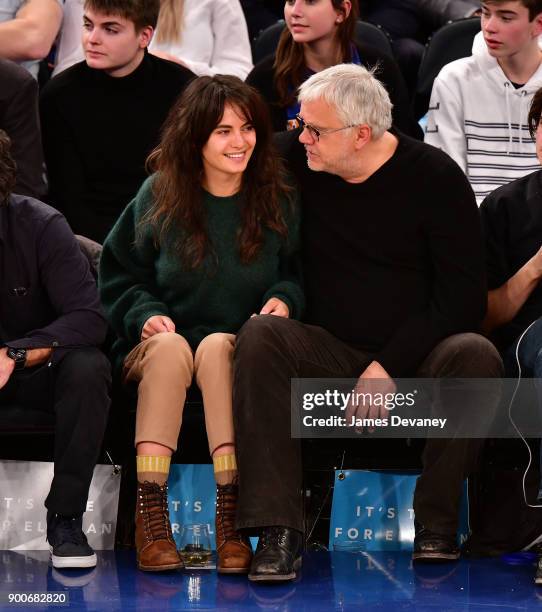 Tim Robbins and guest attend the New York Knicks Vs San Antonio Spurs game at Madison Square Garden on January 2, 2018 in New York City.