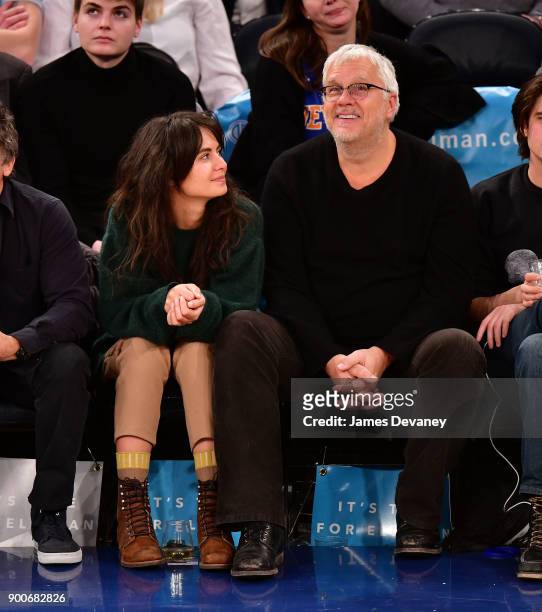 Tim Robbins and guest attend the New York Knicks Vs San Antonio Spurs game at Madison Square Garden on January 2, 2018 in New York City.
