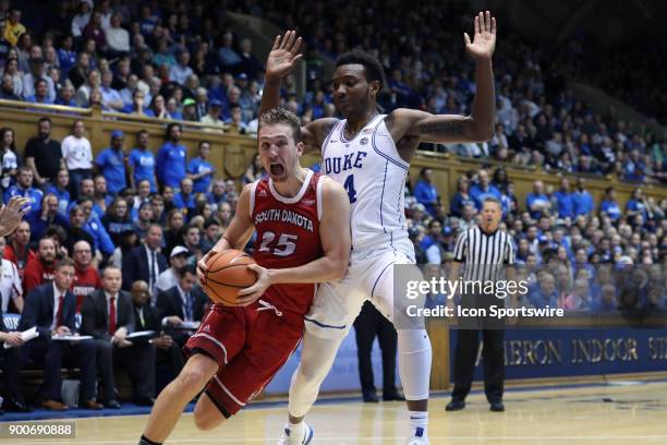 South Dakota's Tyler Hagedorn and Duke's Wendall Carter, Jr. During the Duke Blue Devils game versus the South Dakota Coyotes on December 2, 2017 at...