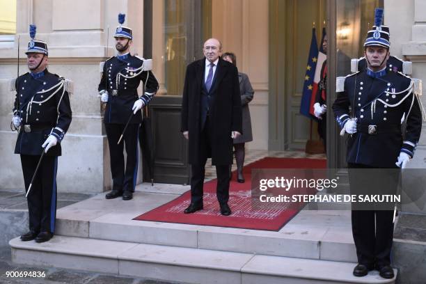 French Interior Minister Gerard Collomb waits for the arrival of ministers to attend a government's New Year breakfast meeting at the Interior...