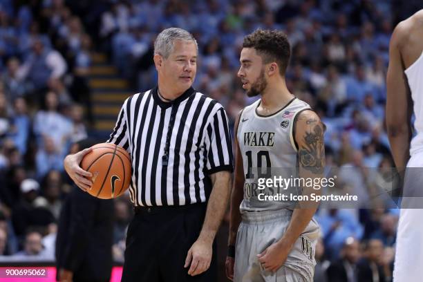 Referee Tim Nestor and Wake Forest's Mitchell Wilbekin during the North Carolina Tar Heels game versus the Wake Forest Demon Deacons on December 30...