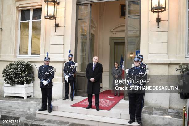 French Interior Minister Gerard Collomb waits for the arrival of ministers to attend a government's New Year breakfast meeting at the Interior...