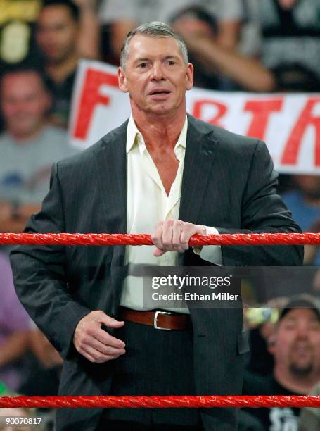 World Wrestling Entertainment Inc. Chairman Vince McMahon appears in the ring during the WWE Monday Night Raw show at the Thomas & Mack Center August...