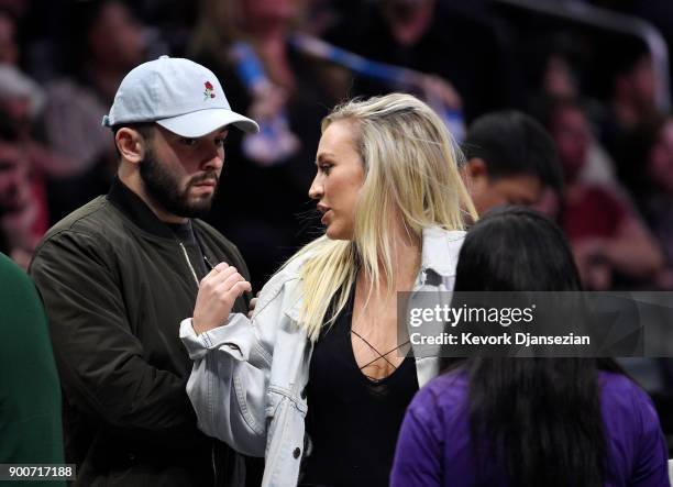 Heisman Trophy winning Oklahoma Sooners quarterback Baker Mayfield and Emily Wilkinson attend a basketball game between the Los Angeles Clippers and...