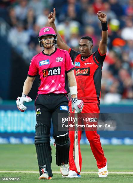 Dwayne Bravo of the Renegades celebrates after dismissing Sam Billings of the Sixers during the Big Bash League match between the Melbourne Renegades...