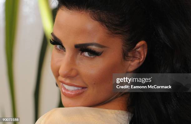 Katie Price poses at the 'What Katie Did Next' Photocall at Sanctum Soho Hotel on August 25, 2009 in London, England.