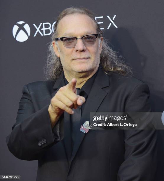 Director/producer/makeup effects artist Greg Nicotero arrives as AMC celebrates the 100th episode of "The Walking Dead" held at The Greek Theatre on...