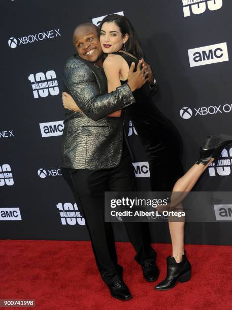 Actor Iron E. Singleton and TV Personality Leanna Vamp arrive for the AMC Celebration of The 100th Episode Of "The Walking Dead" held at The Greek...