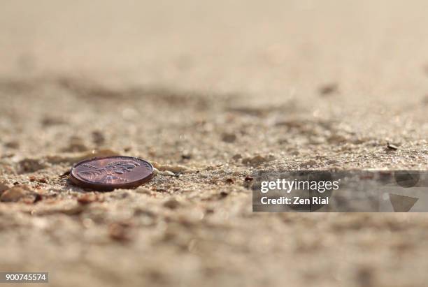 lucky penny on the sidewalk - us penny stock pictures, royalty-free photos & images