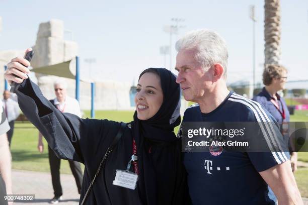 Head coach Jupp Heynckes poses for selfies during a training session on day 2 of the FC Bayern Muenchen training camp at ASPIRE Academy for Sports...