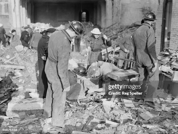 The wreckage of Sandhurst Road School in Catford, south London, the day after it was partially destroyed in a German bombing raid, 21st January 1943....