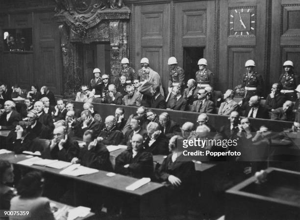 Defendants in the dock in Room 600 at the Palace of Justice, during proceedings against leading Nazi figures for war crimes, at the International...