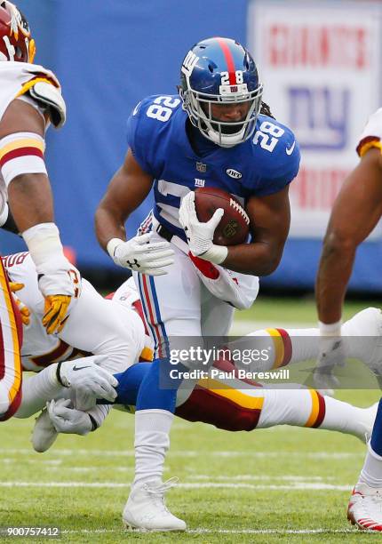 Paul Perkins of the New York Giants runs with the ball in an NFL football game against the Washington Redskins on December 31, 2017 at MetLife...