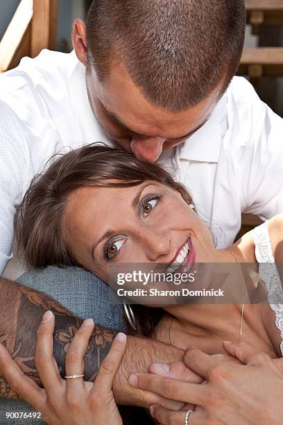 affectionate couple - woman smiling facing down stock pictures, royalty-free photos & images