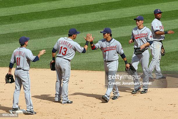 Outfielder Shin-Soo Choo of the Cleveland Indians celebrates with Asdrubal Cabrera after winning the game against the Chicago White Sox on August 9,...