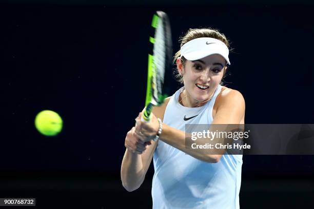 Catherine Bellis of The United States plays a backhand in her match against Karolina Pliskova of Czech Republic during day four of the 2018 Brisbane...