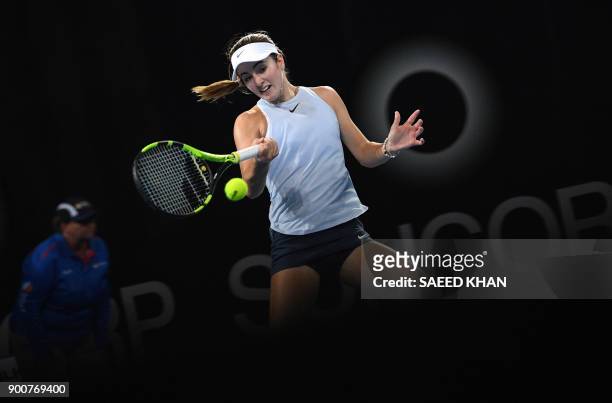 Catherine Bellis of the US hits a return against Karolina Pliskova of the Czech Republic during their women's singles second round match at Pat...