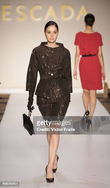 Model showcases designs by Escada on the catwalk during the Mastercard Luxury Week Hong Kong 2009 at The Four Seasons Hotel on August 25, 2009 in...