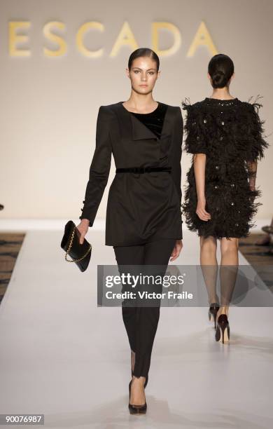 Model showcases designs by Escada on the catwalk during the Mastercard Luxury Week Hong Kong 2009 at The Four Seasons Hotel on August 25, 2009 in...