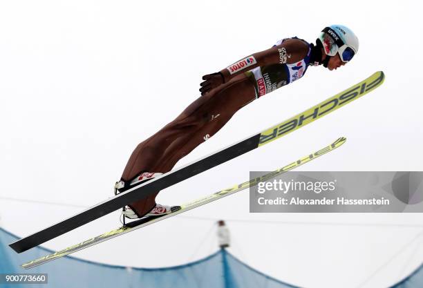 Kamil Stoch of Poland soars through the air during his practice jump on day one of the Innsbruck 65th Four Hills Tournament on January 3, 2018 in...