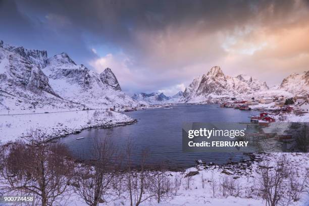 idyllic coastal village at reine in winter, norway - moskenesoya stock pictures, royalty-free photos & images