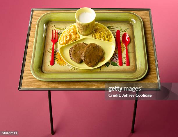 dinner on tv tray - tv dinner stock pictures, royalty-free photos & images