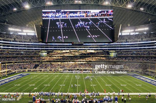 Tennessee Titans A.J. Trapasso in action, hitting HD video screen with punt during 3rd quarter of preseason game vs Dallas Cowboys. Screen is 90 feet...