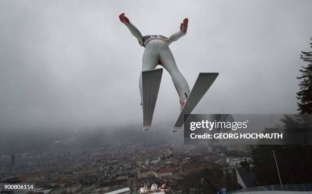 Johann Andre Forfang of Norway jumps during the training round of the third stage at the 66th Four Hills Tournament in Innsbruck, Austria on January...