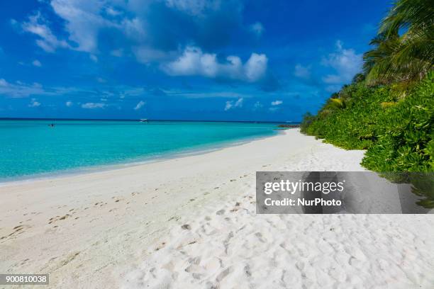 Velassaru Resort in Maldives. A little island resort in the South Male Atoll with exotic beaches, over water villas, clear and turquoise water.