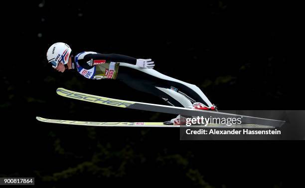 Anders Fannemel of Norway soars through the air during his qualification jump on day one of the Innsbruck 65th Four Hills Tournament on January 3,...