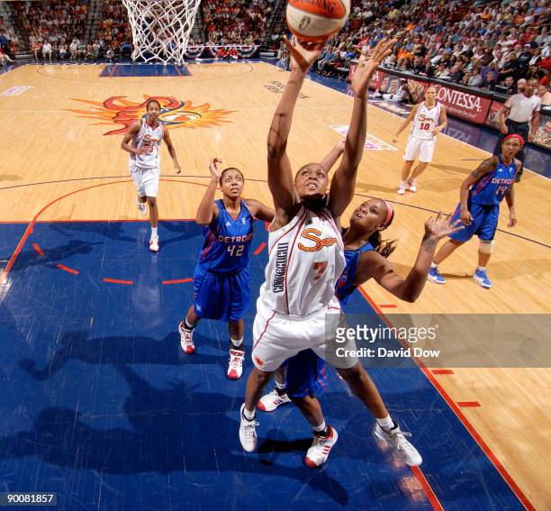 Sandrine Gruda of the Connecticut Sun shoots the basketball against the Detroit Shock during the WNBA game on August 25, 2009 at the Mohegan Sun...