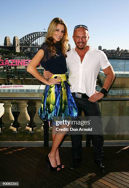 Model Laura Dundovic and fashion designer Alex Perry pose at the launch of ACP Magazine's "30 Days of Fashion & Beauty", a month-long calendar of...