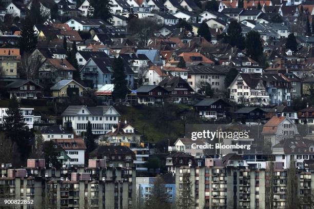 Residential apartment blocks and traditional Swiss residential properties stand in Bern, Switzerland, on Monday, Jan. 1, 2018. The supply of...