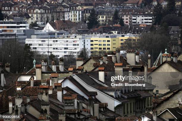 Residential apartment blocks and traditional Swiss residential properties stand in Bern, Switzerland, on Monday, Jan. 1, 2018. The supply of...