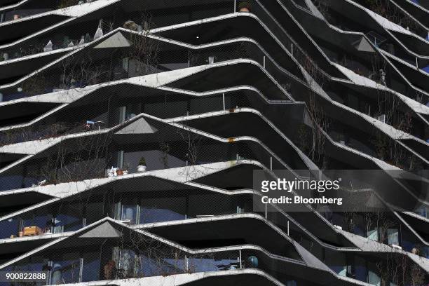 Balconies surround the exterior of a residential apartment block in Bern, Switzerland, on Monday, Jan. 1, 2018. The supply of uninhabited apartments...