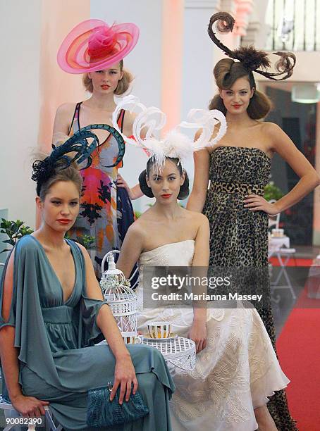 Models wearing designs by Leona Edmiston, Manning Cartell, Akira and Lisa Ho pose at the launch of Melbourne GPO's "Fashion at Altitude" Melbourne...