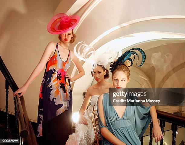 Models wearing dresses by designers Manning Cartell, Akira and Leona Edmiston and headpieces by Paris Kyne Master Milliner pose at the launch of...