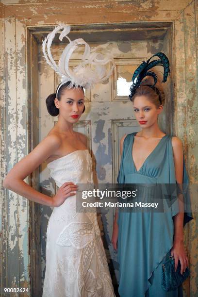 Model Ruby wearing an Ivory dress by Akira and model Ania wearing a turquoise dress by Leona Edmiston pose at the launch of Melbourne GPO's "Fashion...