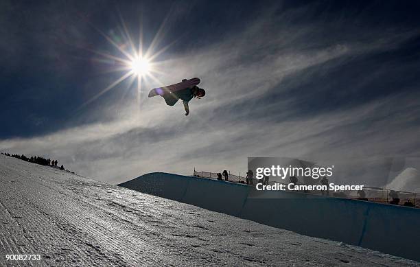 Competitor performs a move in the men's Snowboard Halfpipe during day five of the Winter Games NZ at Cardrona Alpine Resort on August 26, 2009 in...