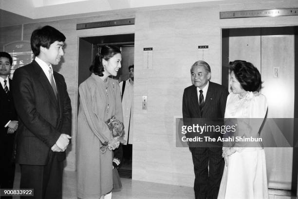 Prince Takamado, Princess Hisako and their daughter Princess Tsuguko visit a confectionery exhibition at Daimaru Museum on February 11, 1991 in...