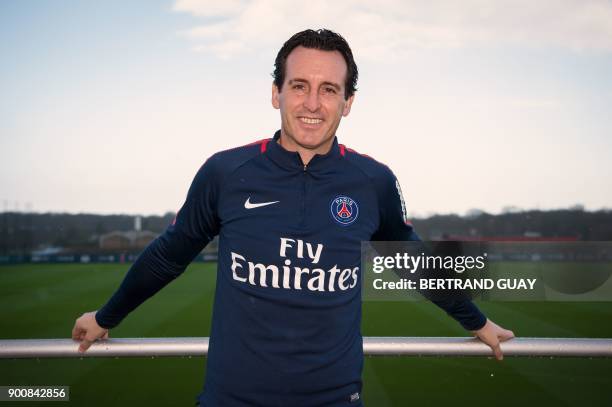 Paris Saint-Germain's Spanish coach Unai Emery poses during a photo session in Saint-Germain-en-Laye, western Paris, on January 3, 2018. / AFP PHOTO...
